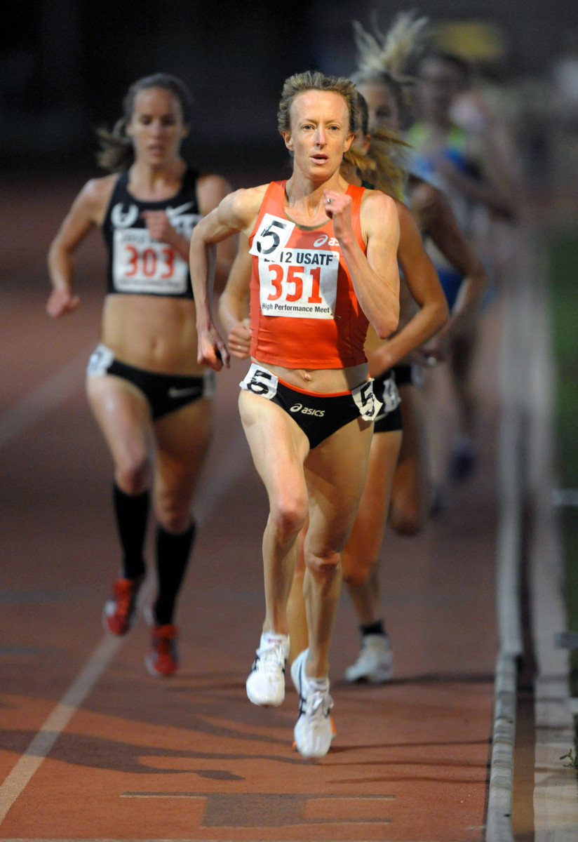 At 48, Kastor (pictured in 2012) still puts in hundreds of miles each week.
